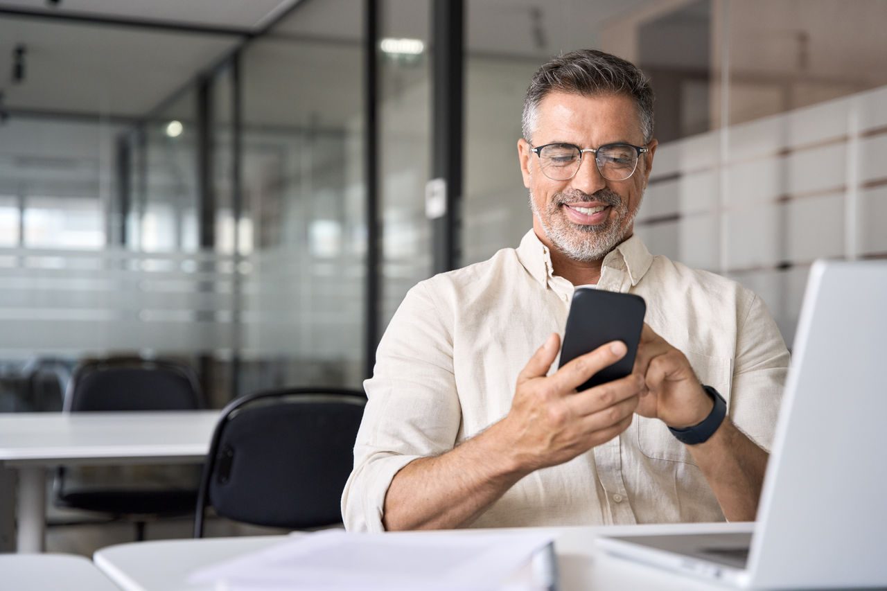 man typing on the phone