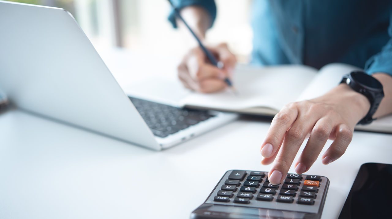 woman using calculator